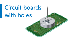 Circuit boards with holes